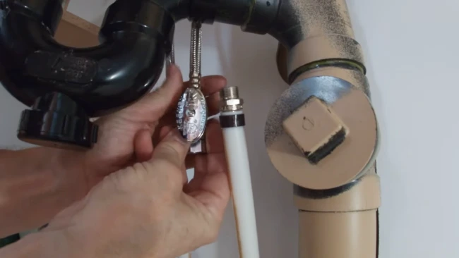 Can I install a shut-off valve myself under my sink
