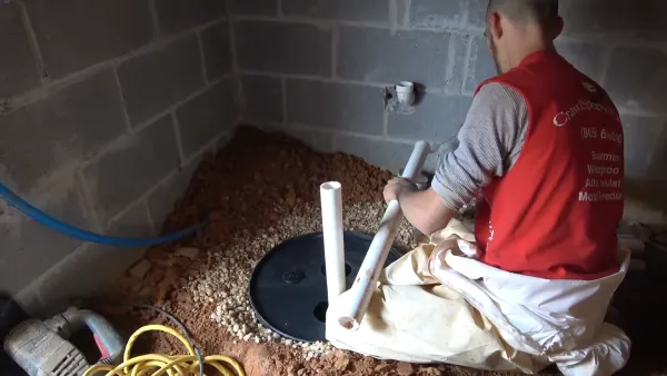 How to install a sump pump discharge hose