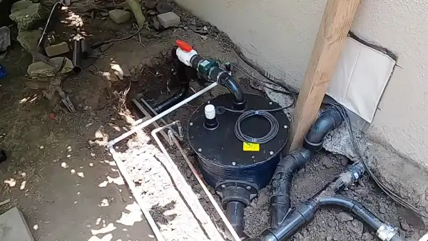Does an air admittance valve stop smells in the sewage pump area