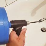 how to use a plumber's auger