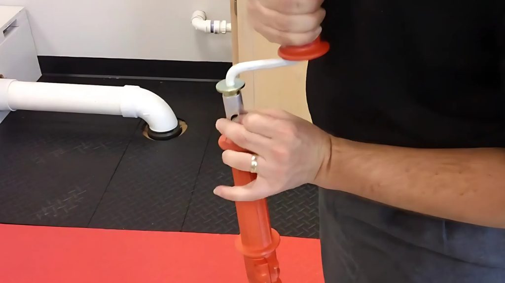 how to clean toilet auger